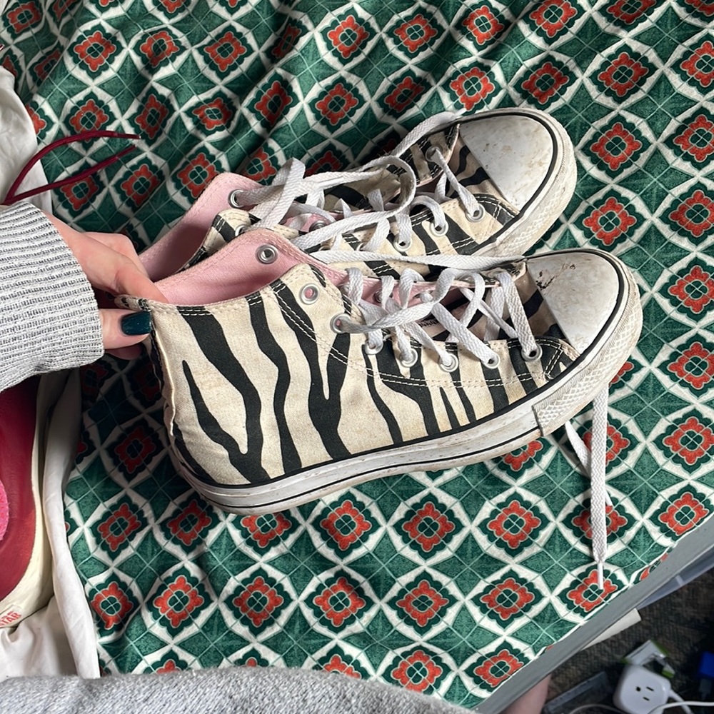 Custom zebra print and light pink high top chucks